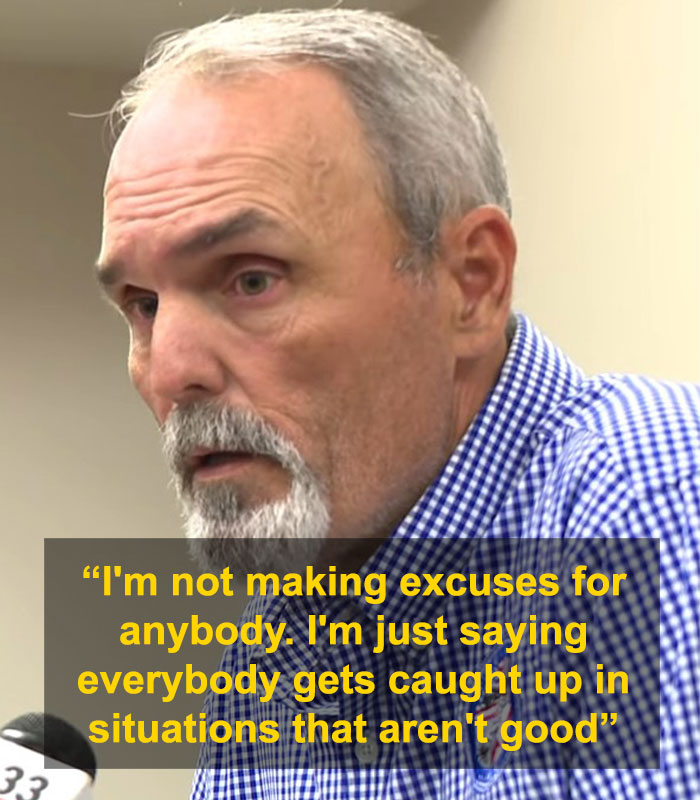 Police chief in blue checkered shirt addressing media after leaked video exposes disturbing moment with dispatcher.