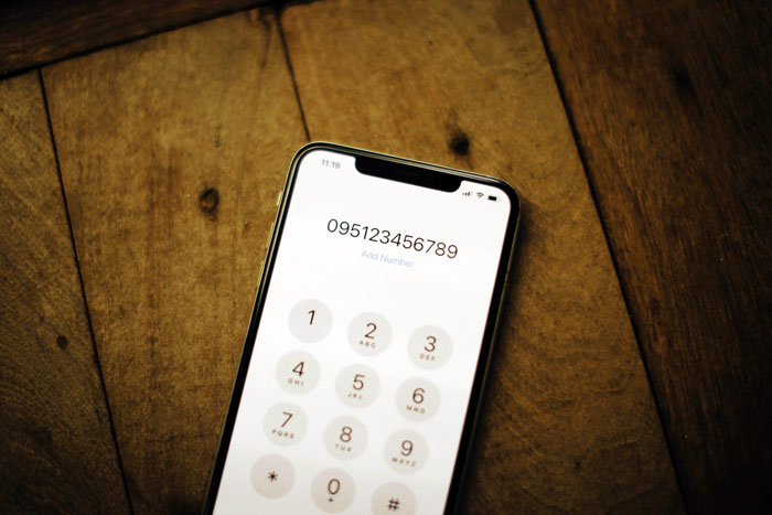 Smartphone screen displaying an unknown number dialing, representing a mystery caller causing distress to a daughter-in-law.