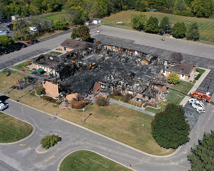 Aerial view of a burned Michigan church damaged in attack as Mormons raise funds for the incident recovery efforts.