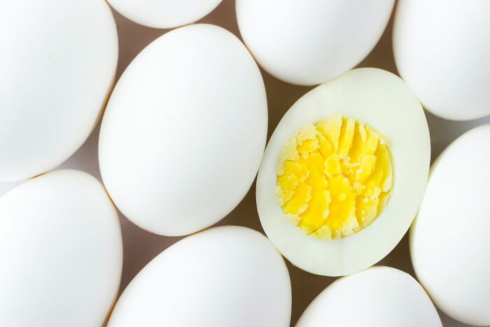 Close-up of whole and sliced hard-boiled eggs illustrating common truths people were fooled into believing as propaganda.