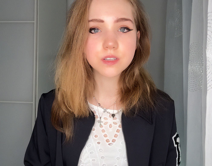 Young German activist known as Anti-Greta seeking asylum in the US, encouraged by Elon Musk in a casual setting.