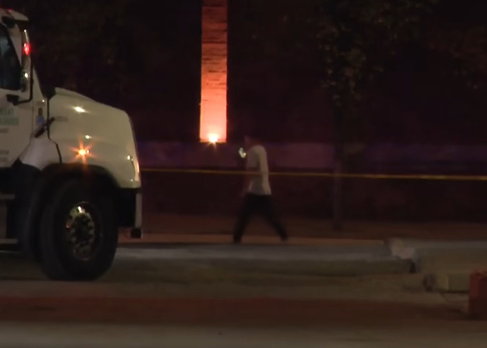 Man walking near large truck at night captured in disturbing Mark Sanchez footage showing bizarre behavior before alleged attack.