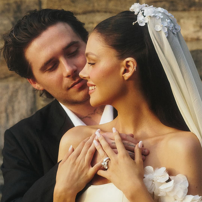 Couple in wedding attire sharing an intimate moment, highlighting a very creepy relationship theme for SEO.