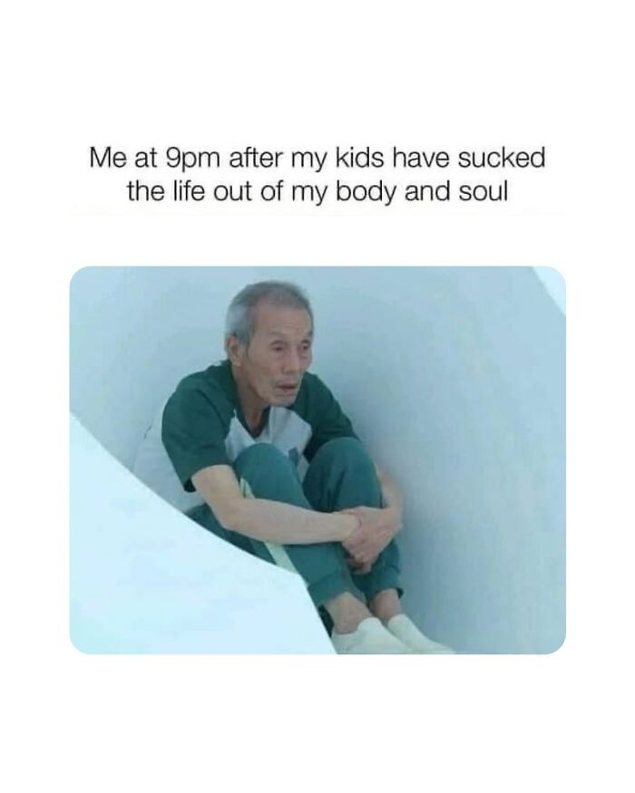 Tired parent sitting alone looking exhausted at 9pm, depicting the chaos and sleep deprivation of parenting.