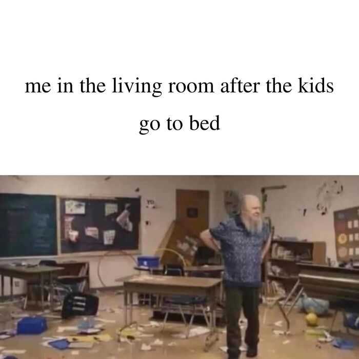 Parent standing in chaotic, messy room representing parenting chaos and laundry after kids go to bed.