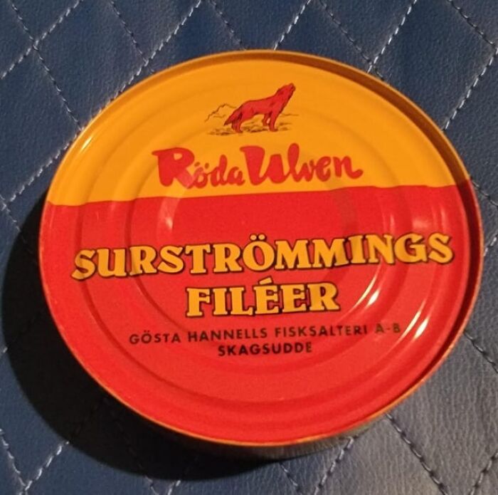 Surströmmings filéer in a colorful can, an example of foods not popular in their country despite tourist interest.