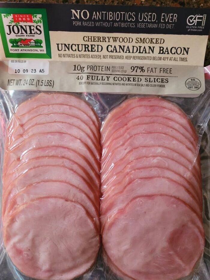 Package of cherrywood smoked uncured Canadian bacon, an example of foods not popular in their country despite tourist expectations.