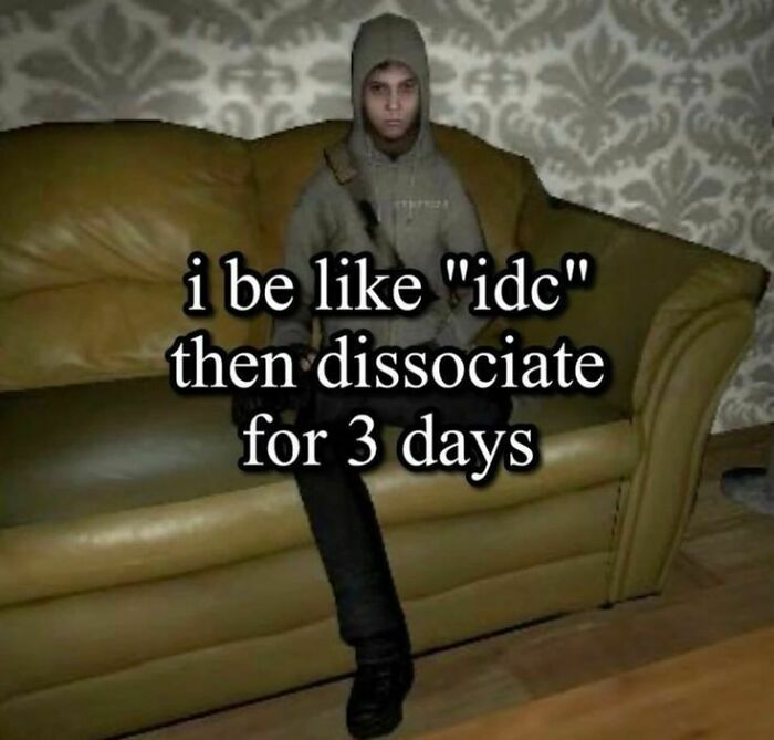 Person in a hoodie sitting on a couch with text meme about dissociating, reflecting unhinged evil thoughts humor.