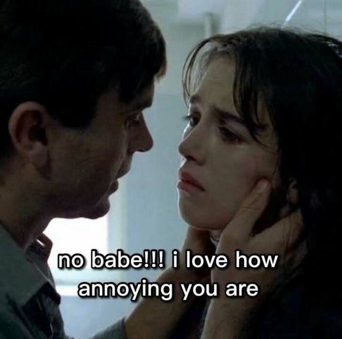 Couple in an intense moment with a humorous meme text about loving annoying behavior, reflecting evil thoughts humor.