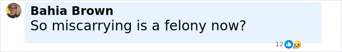 Woman with glasses reacts skeptically to a comment about miscarrying being a felony in a social media post.