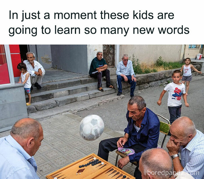Kids about to experience unexpected chaos as an airborne soccer ball interrupts a quiet outdoor game moment before disaster.