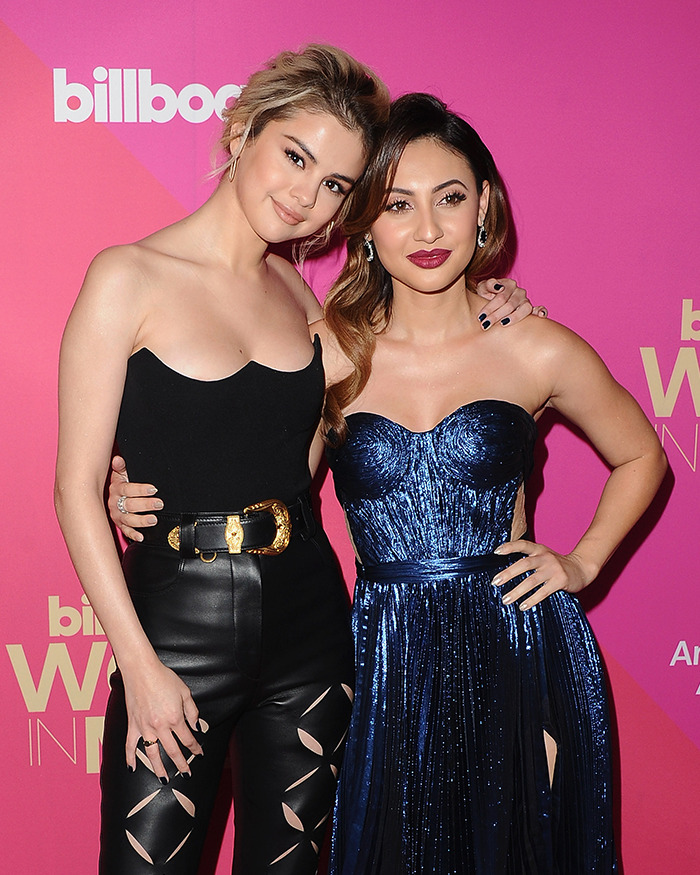 Two women posing at a Billboard event, highlighting Selena Gomez's kidney donor breaking silence amid wedding snub claims. Two women posing at a Billboard event, highlighting Selena Gomez's kidney donor breaking silence amid wedding snub claims.