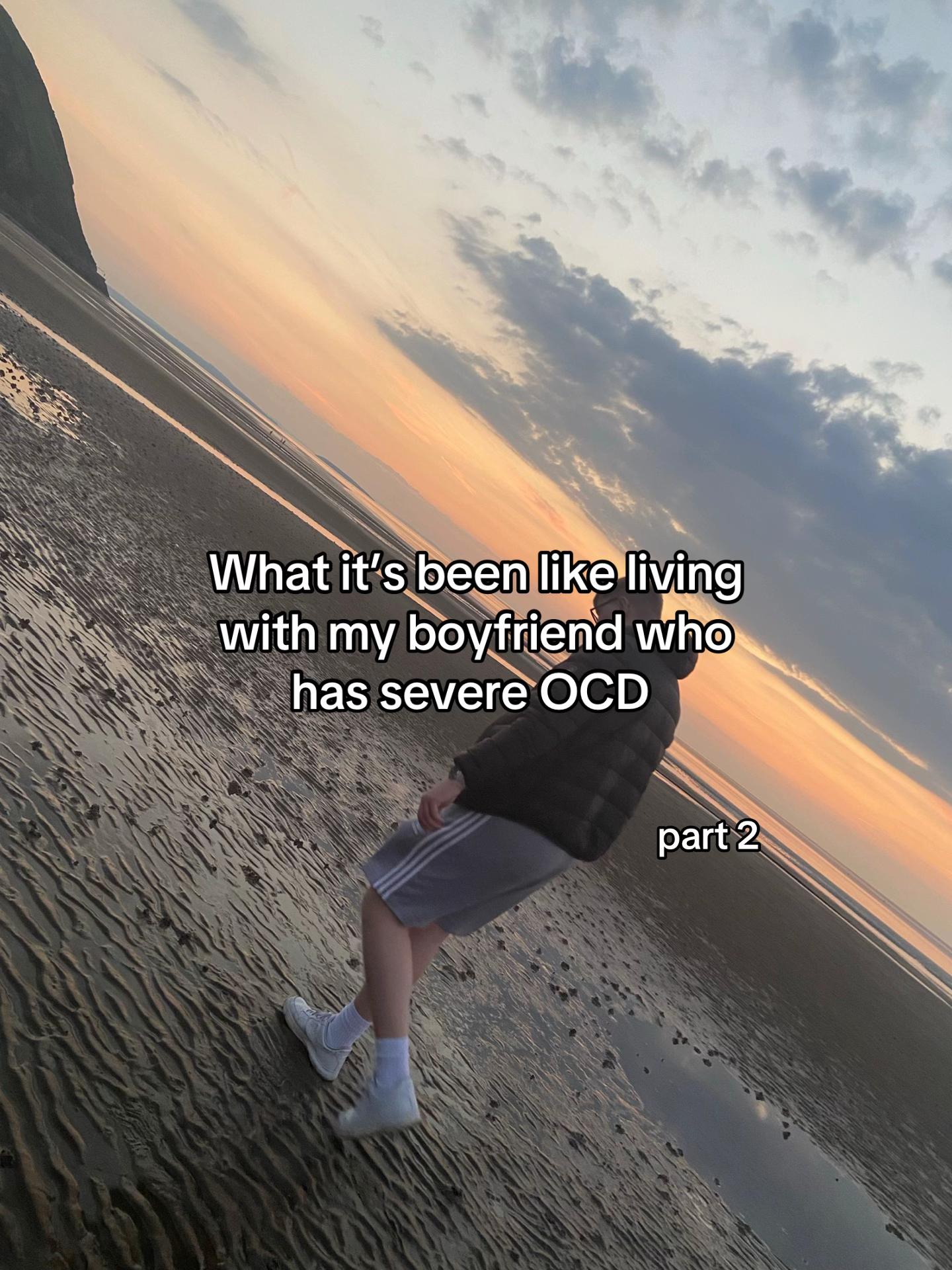 Man walking on beach at sunset, illustrating life with a boyfriend who has severe OCD in a viral honest post.