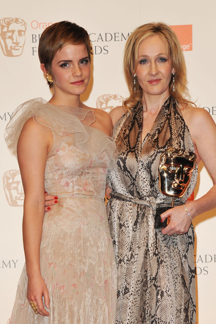 Emma Watson with J.K. Rowling at an awards event, linked to Rowling trans rights controversy and SNL mockery.