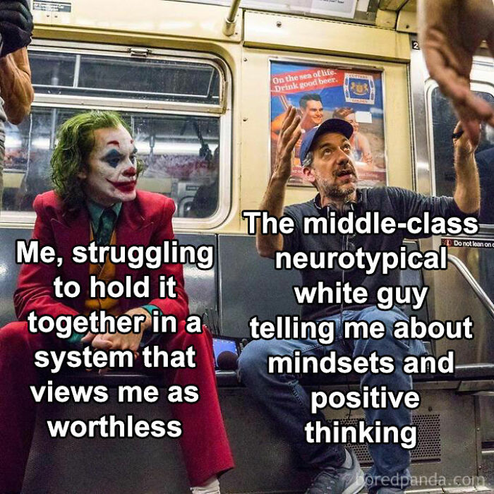 Man in Joker costume sitting on subway struggling with system, while man talks about mindsets and positive thinking, dystopic society.