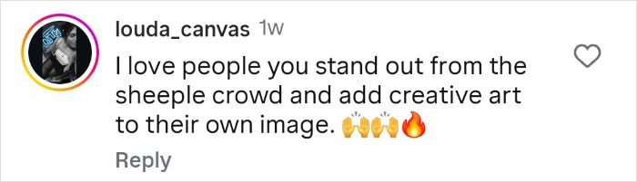 Comment text praising tattooed woman for standing out with creative art and unique image posted on social media.