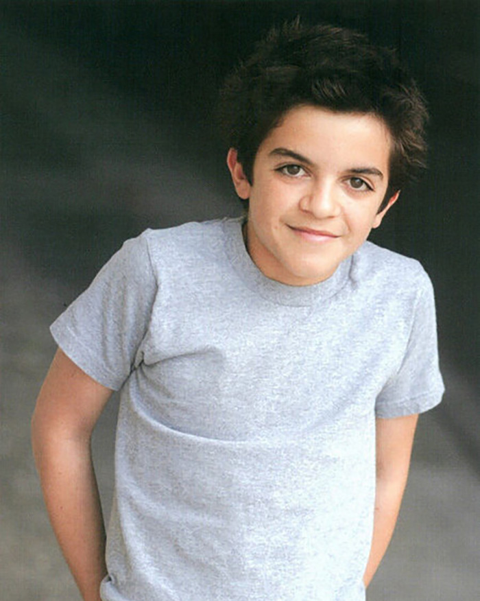 Daniel Curtis Lee posing casually in a gray t-shirt with a slight smile, relating to Daniel Curtis Lee news.