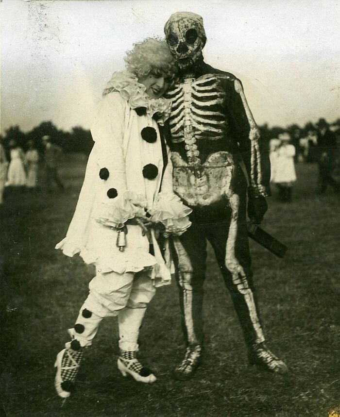 Vintage Halloween costumes featuring a clown and skeleton, showcasing terrifying and impressive past Halloween costume styles.