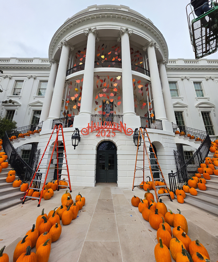 White House Halloween display with pumpkins and fall decorations being set up ahead of 2025 celebration.