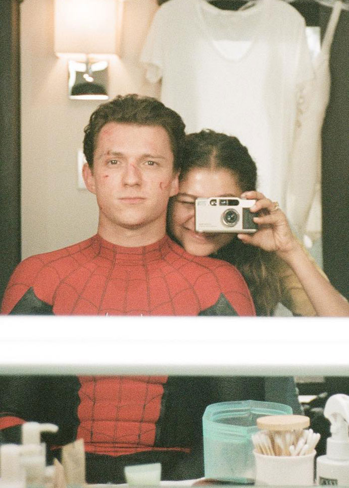 Zendaya fans convinced she's pregnant after viral photo with Lisa, showing close-up of her face and expressions.