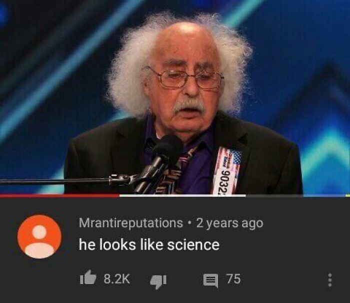 Elderly man with frizzy white hair and glasses captured in a video with a hilarious YouTube comment displayed below.