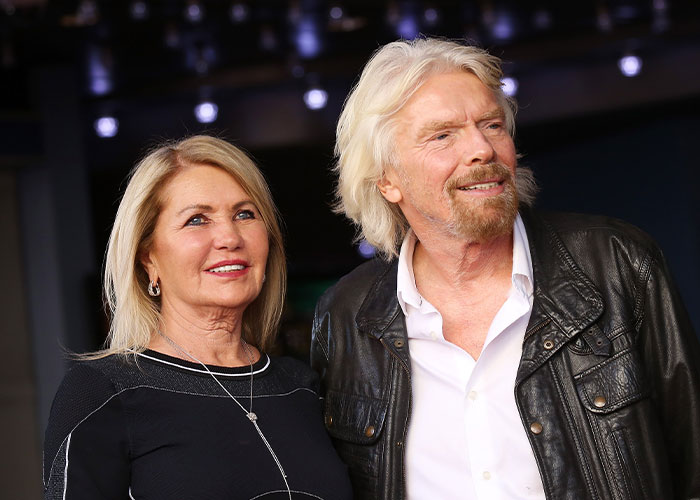 Richard Branson with his wife Joan, posing together at an event before her passing, showing a heartfelt moment.