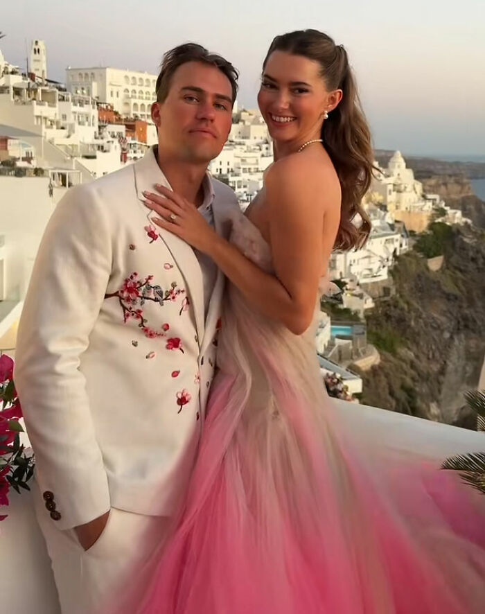 Couple dressed elegantly posing outdoors during sunset, related to influencer partying with contagious infection controversy. Couple dressed elegantly posing outdoors during sunset, related to influencer partying with contagious infection controversy.
