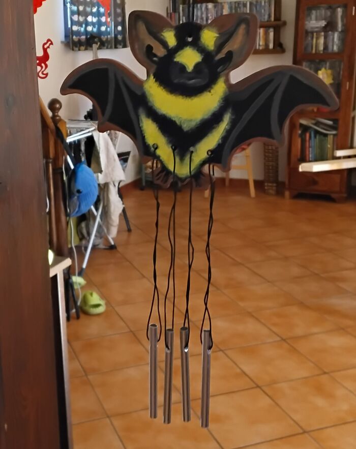 Hand Painted Bat Wind Chimes My Daughter Made For Me. This Is The Badger Bat