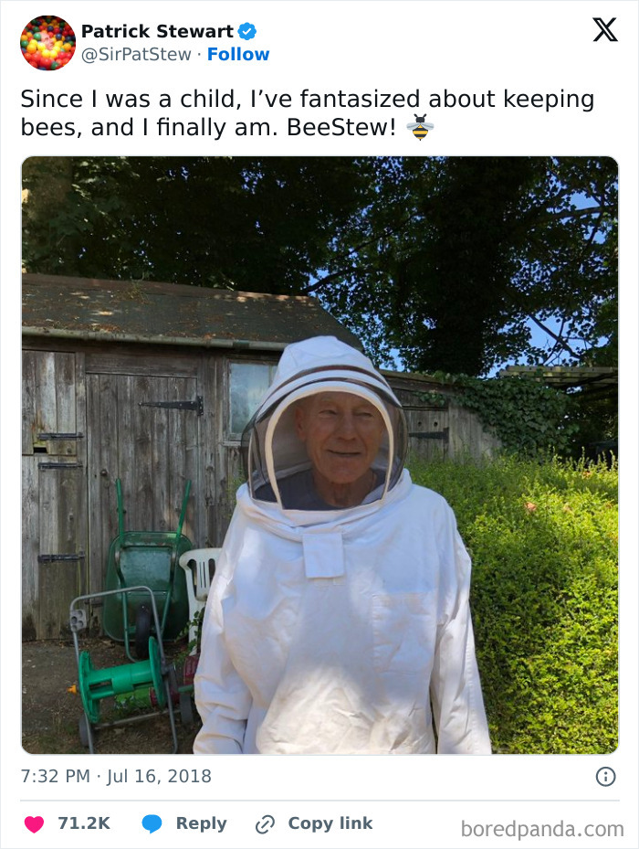 Man in a beekeeping suit smiling outdoors near garden shed, showcasing big and small dreams turned into reality.