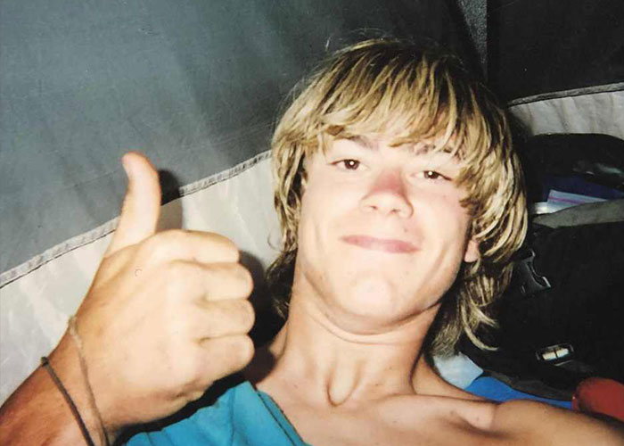 Young man with blond hair giving a thumbs up in a casual setting, related to Las Vegas museum display claims.