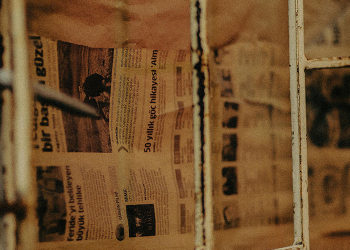 Old newspaper found hidden behind a wall, one of the fascinating items people discovered in the walls of their homes.