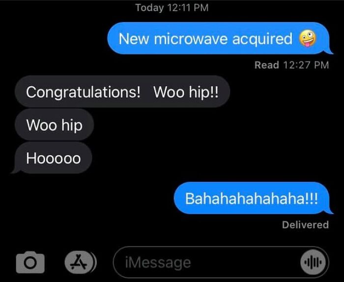 Text message conversation showing a funny autocorrect fail with "New microwave acquired" and humorous replies.