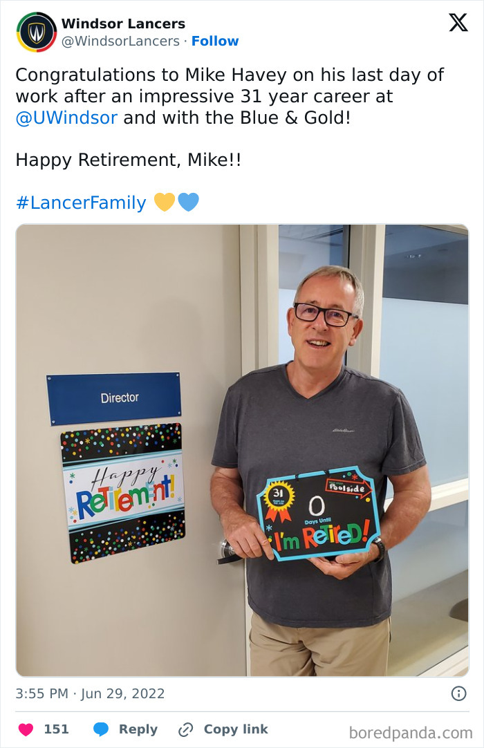 Man holding retirement sign near office door, example of employees who walked out with jokes and pranks.