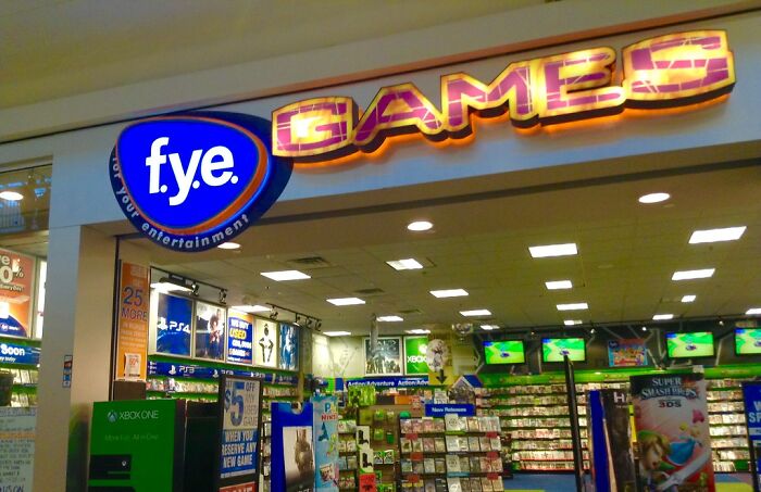 f.y.e. Games store entrance with video games and consoles visible, illustrating worst Black Friday employee experiences