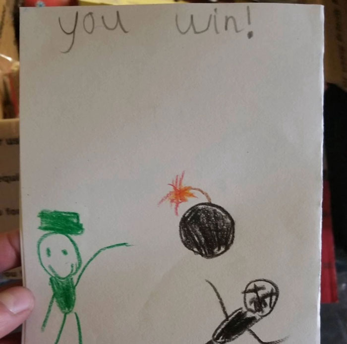 Hand-drawn letter from a child to U.S. soldiers, featuring a green soldier, a b**b, and the phrase you win.