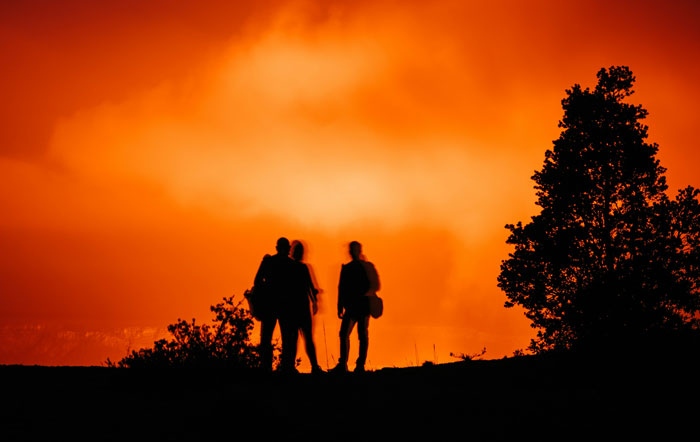 Silhouettes of three people against a fiery orange sky, evoking an intense and dramatic Oscar-worthy performance scene.