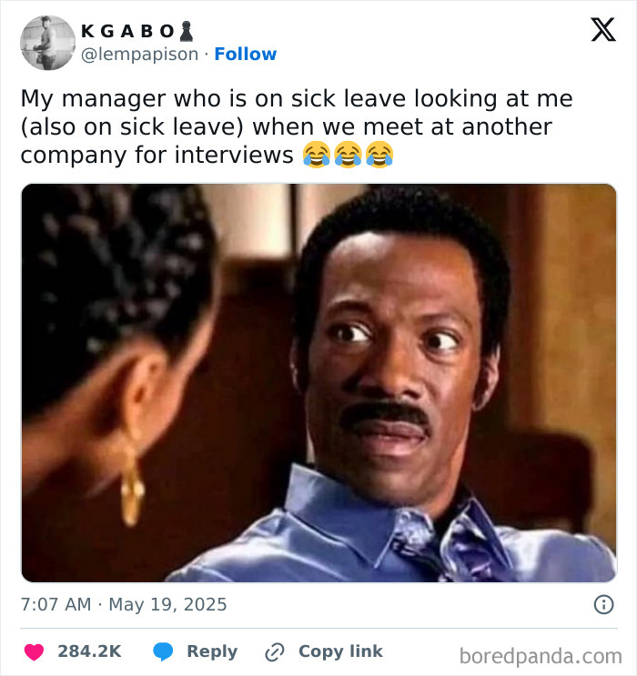 Man giving a side-eye glance in an office setting, illustrating relatable feelings of having a job.