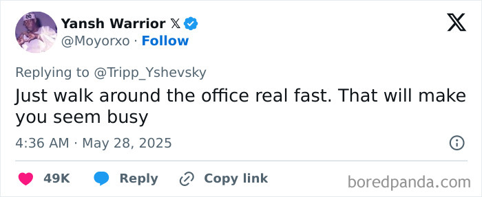 Tweet showing a humorous take on appearing busy at work, reflecting common experiences of having a job.
