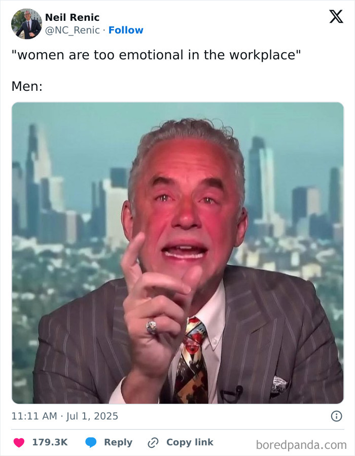 Man in pinstripe suit making a frustrated expression representing emotions at work in a tweet about having a job.