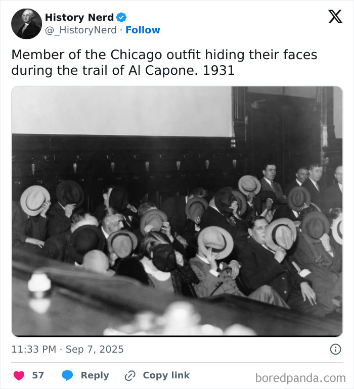 Black and white historic photo showing members of Chicago outfit hiding faces during Al Capone trial in 1931.