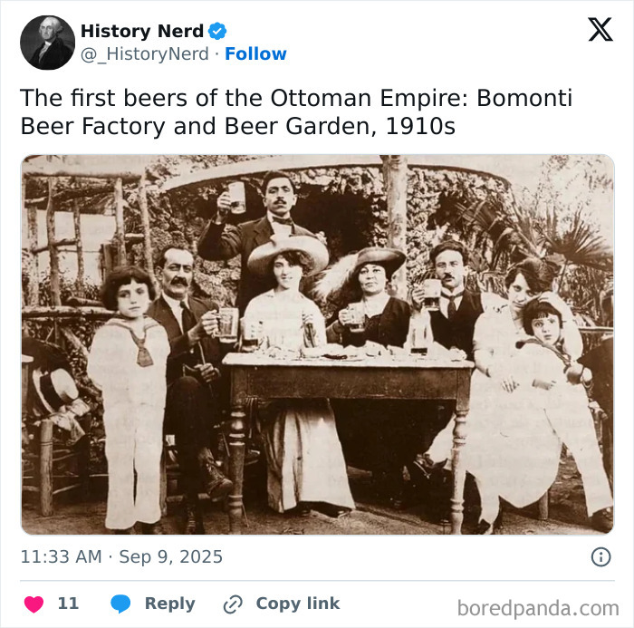 Group of people raising beer mugs at Bomonti Beer Factory and Garden in the Ottoman Empire, early 1900s, exploring history rare photos.