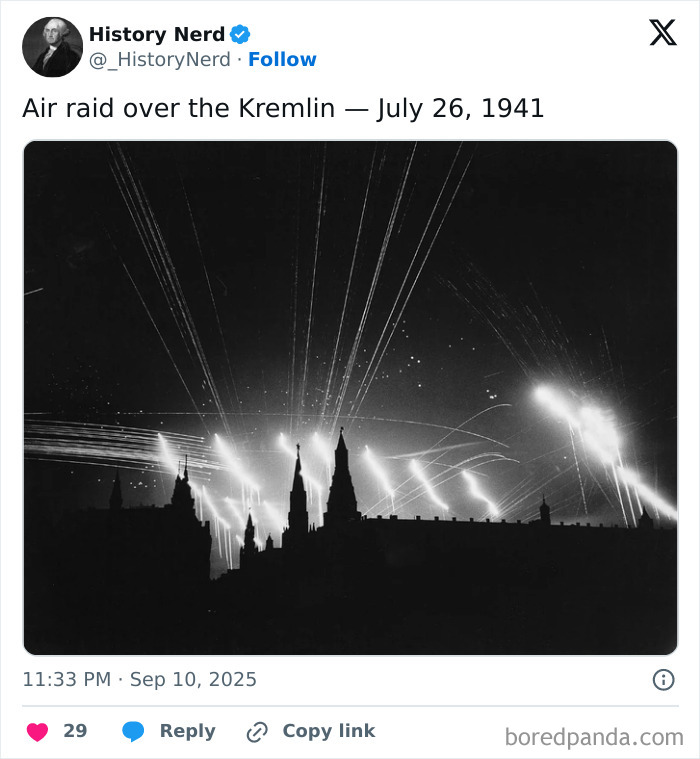Air raid over the Kremlin at night with searchlights and tracer fire during a powerful moment in history.