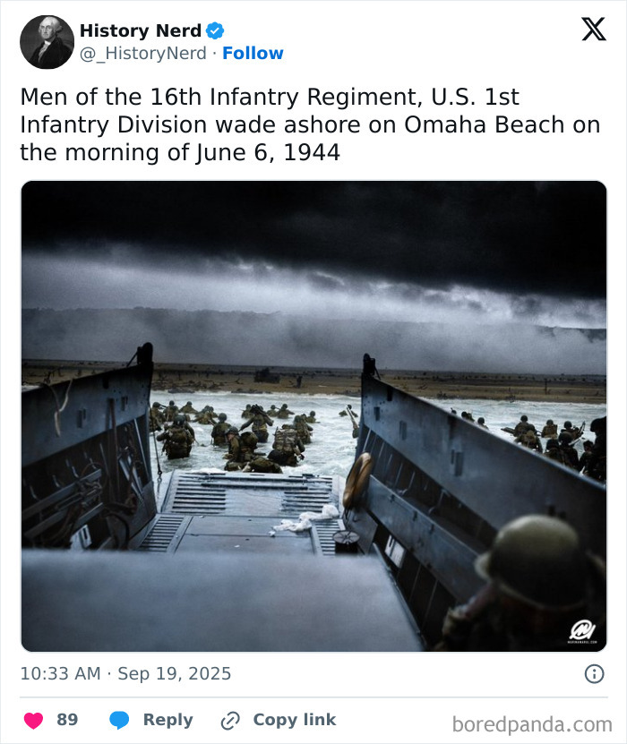 Soldiers of the 16th Infantry Regiment wading ashore on Omaha Beach during a powerful moment in exploring history.