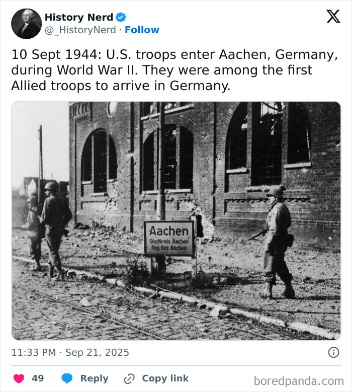 U.S. troops entering Aachen, Germany during World War II in a rare and powerful historic moment of history.