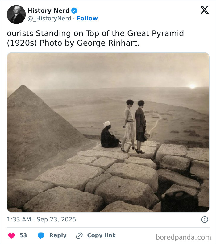 Three people standing on top of the Great Pyramid in a rare and powerful historic photo from the 1920s.
