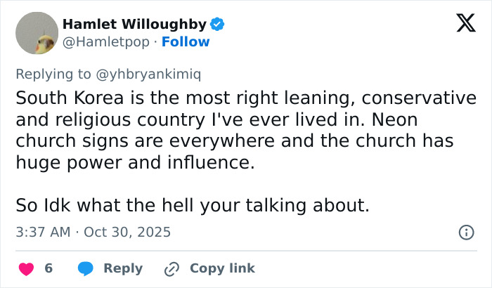 Screenshot of a Twitter reply discussing South Korea&rsquo;s conservative culture amid asylum controversy involving the world&rsquo;s smartest man.