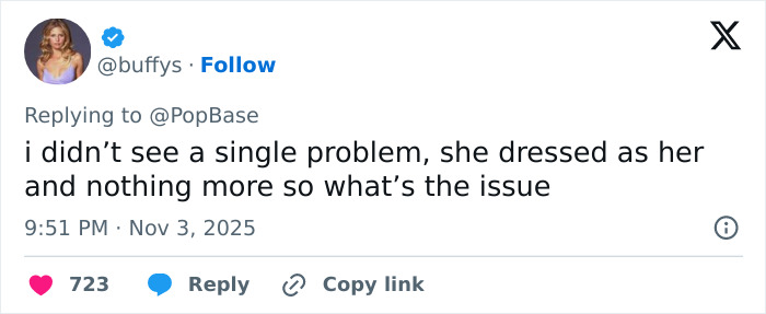 Screenshot of a tweet defending Winnie Harlow's Whitney Houston Halloween look amid massive backlash and controversy.