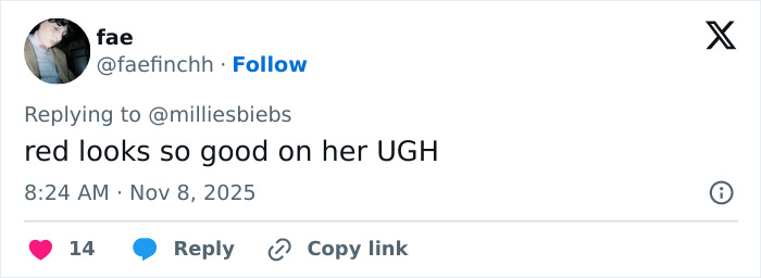 Screenshot of a Twitter reply praising Millie Bobby Brown&rsquo;s look amid discussions on natural breasts and dress reactions.