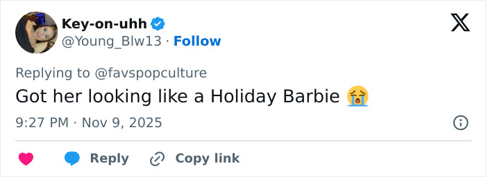 Fan reaction tweet with laughing emoji, commenting on Meghan Trainor's new look related to She Lost Her Bass.