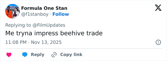 Michelle Yeoh at a premiere wearing a bold outfit resembling a wasp nest, sparking a meltdown online.